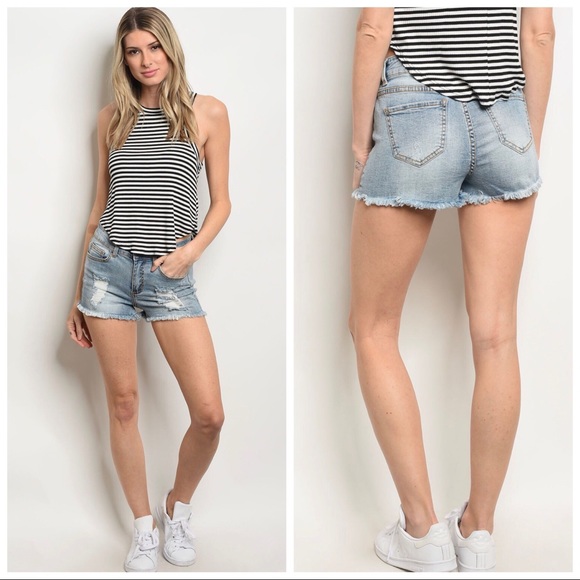 Pants - Mid Rise Medium light wash distressed denim shorts